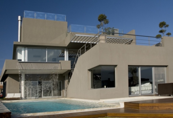 Дом с водопадом от Andres Remy Architects